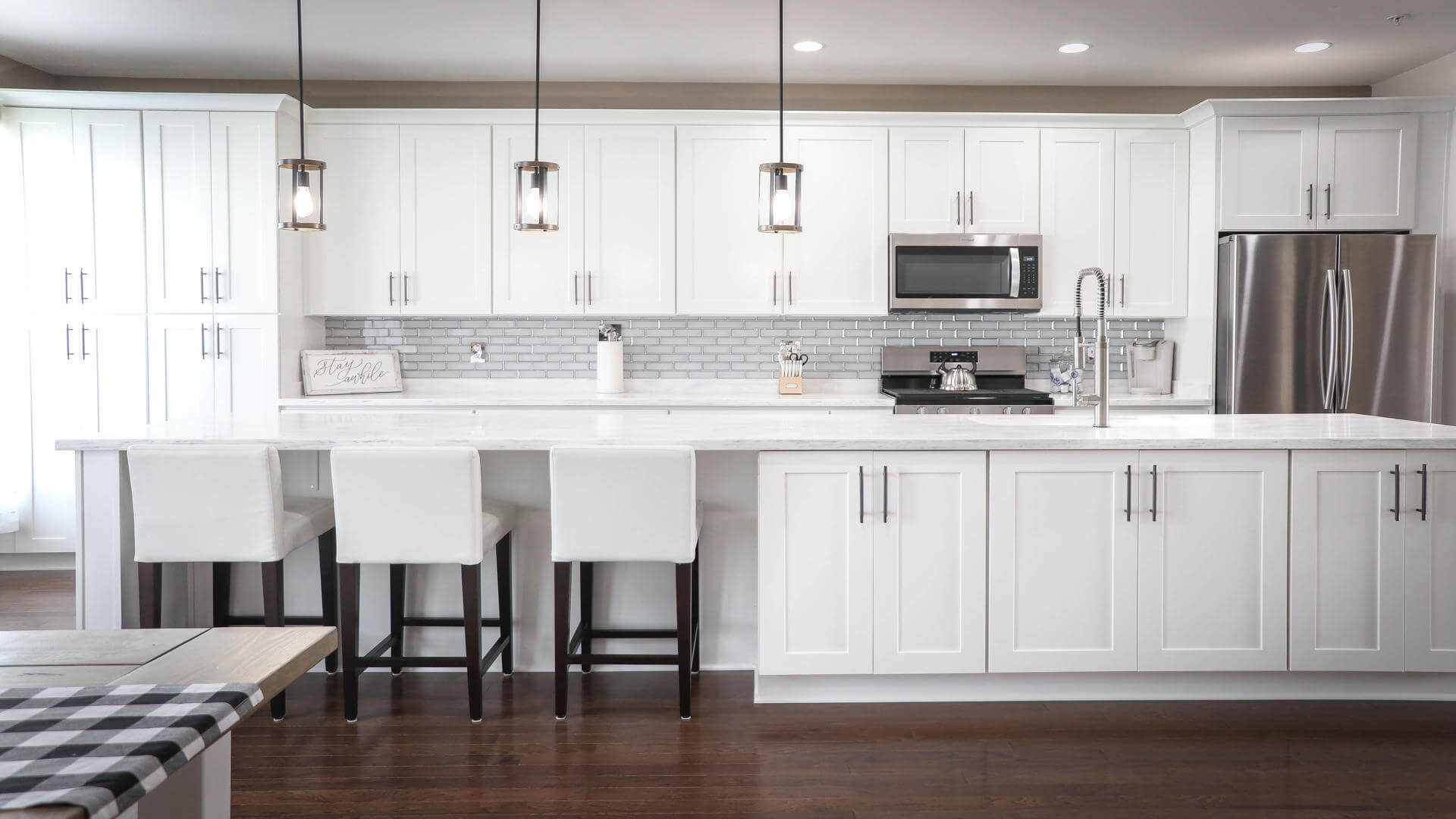 White kitchen cabinets by Kraftsman Cabinetry