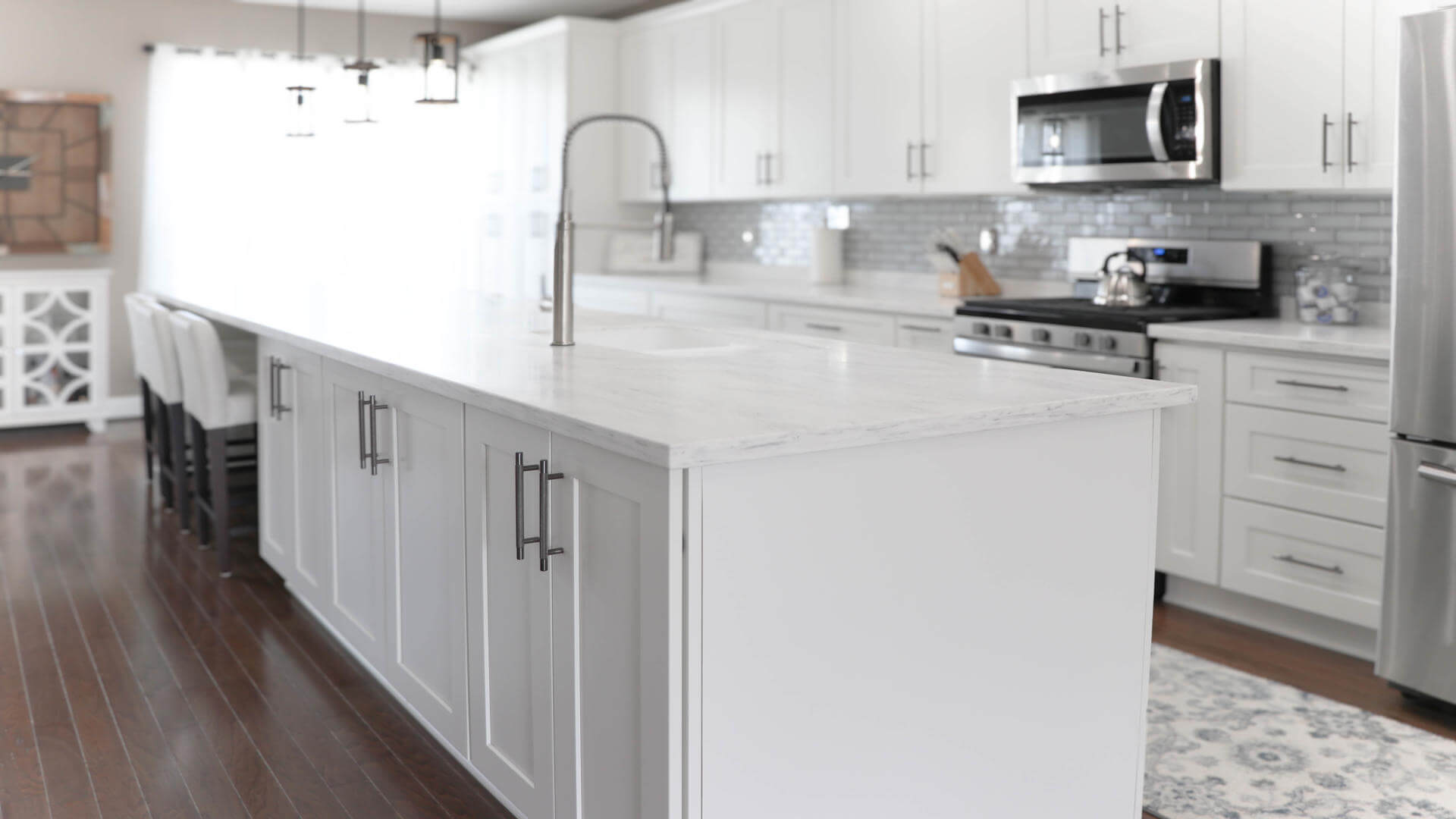 White kitchen cabinets by Kraftsman Cabinetry View 4